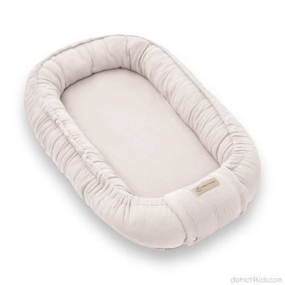 Babynest Musselin Beige - Mitwachsendes Kuschelnest aus atmungsaktivem Musselin