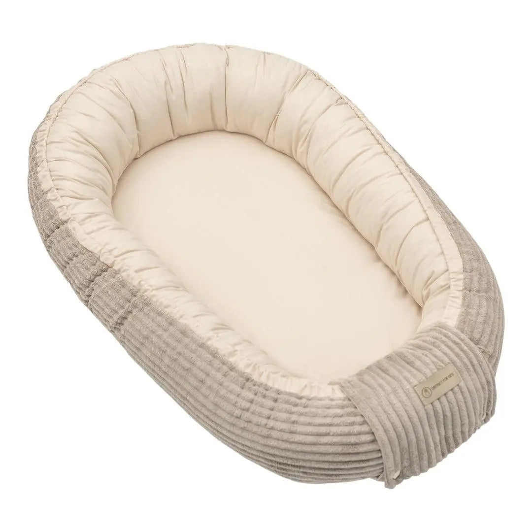 Babynest Cord creme - Mitwachsendes Kuschelnestchen & Reisebett ab Geburt