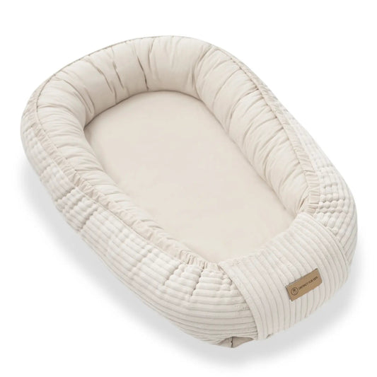 Babynest Cord creme - Mitwachsendes Kuschelnestchen & Reisebett ab Geburt