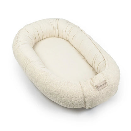 Babynest Bouclé Beige - Mitwachsendes Kuschelnest aus weichem Teddystoff