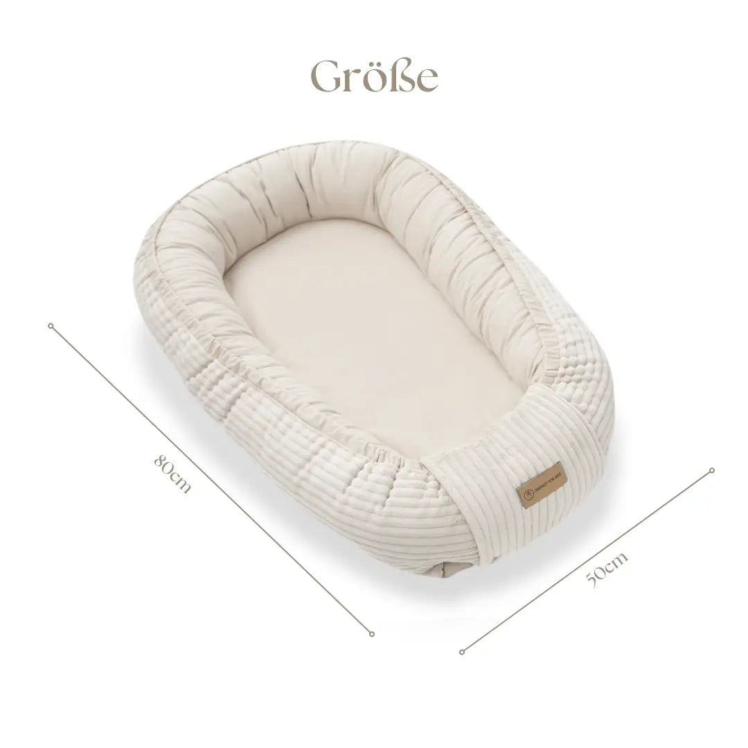Babynest Cord creme - Mitwachsendes Kuschelnestchen & Reisebett ab Geburt
